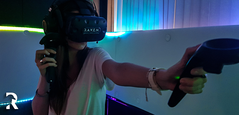 Woman Playing VR in colorfull booth